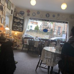 The seating area, it is small but not cramped.