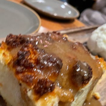 Liquid Assets - Bread pudding with rum sauce and house made ice cream. - American Near Me - Ocean City, Maryland Liquid Assets - Bread pudding with rum sauce and house made ice cream. - American Near Me - Ocean City, Maryland