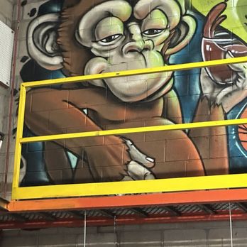 The Infinite Monkey Theorem - Mural in warehouse area - Wineries Near Me - Denver, Colorado
