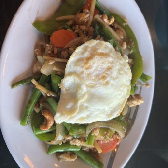 Tea Star Cafe - Basil Chicken with Green Beans, onions, bamboo shoots, green bell peppers and carrots. Fried egg on top. - Thai Near Me - Spartanburg, South Carolina Tea Star Cafe - Basil Chicken with Green Beans, onions, bamboo shoots, green bell peppers and carrots. Fried egg on top. - Thai Near Me - Spartanburg, South Carolina