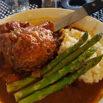 District 7 Grill - Pork shank osso buco...yum!  I couldn't eat it all...you might be able to share this if you had an appetizer - Breakfast & Brunch Near Me - Houston, Texas