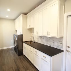 Gr8 Kitchens - In this project we blew out a wall and expanded the laundry room space into the unused portion of the clients 3.5 gar garage....