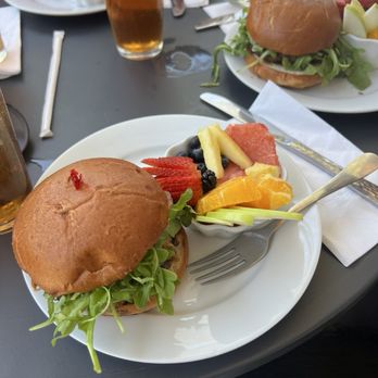 Wild Fig Kitchen - The Wild Fig burger (goat cheese, fig jam, yum!) with a side of fresh fruit and an iced tea. - Breakfast & Brunch Near Me - Coarsegold, California Wild Fig Kitchen - The Wild Fig burger (goat cheese, fig jam, yum!) with a side of fresh fruit and an iced tea. - Breakfast & Brunch Near Me - Coarsegold, California