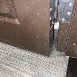 Dirt and dust and the door of the restroom Dirt and dust and the door of the restroom