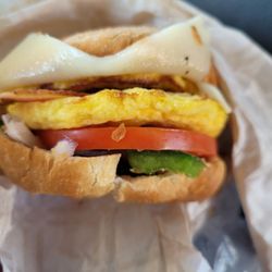 Speedway - Double egg, bacon, Swiss cheese, tomato, green pepper and onion on a croissant..