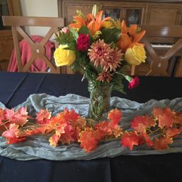Grocery store flower arrangement. Not even close to low profile for a center piece. Grocery store flower arrangement. Not even close to low profile for a center piece.