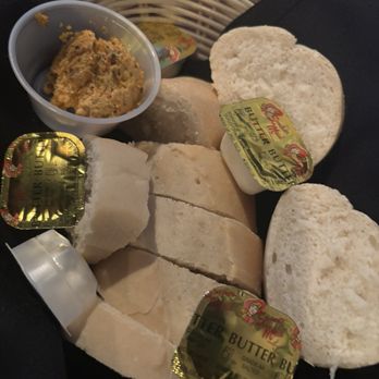 Carmine's - House bread w olive roasted red pepper butter - Sicilian Near Me - Williamsville, New York