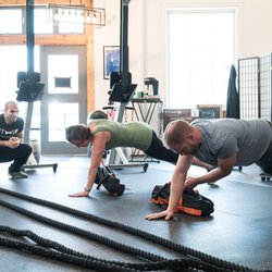 The Fit Inn - The instruction of a personal training session at the cost of group fitness.