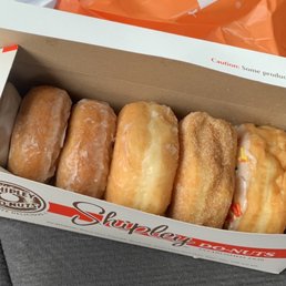 1/2 dozen: cinnamon sugar, glazed, cake glazed, white frosting with sprinkles