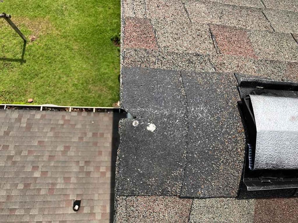 Slide of Craftsman Roofing