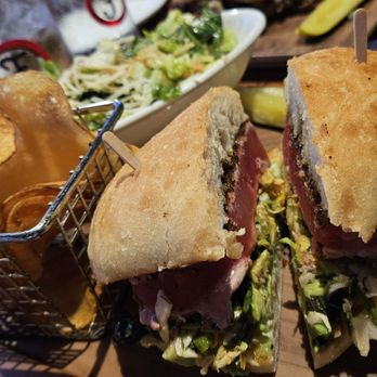 Finney's Crafthouse - Orange - Blackened ahi sandwich with homemade chips and Cesar salad. I wouldn't get the salad again due to the strong tasting crouton crumbles. - New American Near Me - Orange, California