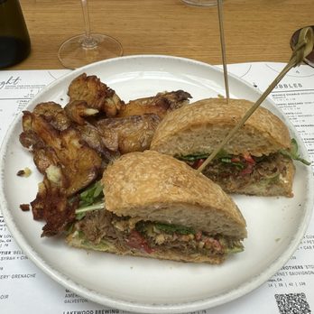 Sixty Vines - Roasted pork sandwich - Wine Bars Near Me - Houston, Texas Sixty Vines - Roasted pork sandwich - Wine Bars Near Me - Houston, Texas
