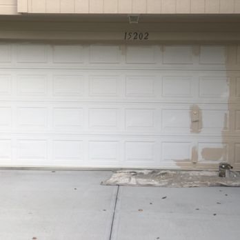 Divine Improvements - Before: client wanted garage to match house color. - Painters Near Me Divine Improvements - Before: client wanted garage to match house color. - Painters Near Me