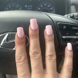 Bells Nails And Spa - Crooked middle nail.