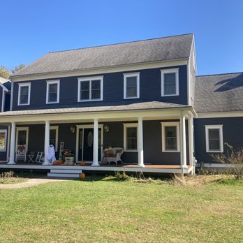 PLJ Carpentry - All cement board siding painted dark grey. Porch columns sanded and re-painted white to match trim. - Roofing Near Me - Yarmouth, Massachusetts