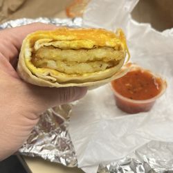 Egg breakfast burrito. Very meh. Awful salsa.