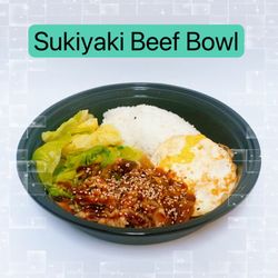Teana Boba Cafe - Sukiyaki (Sue-Key-Ya-Key) Beef with soft cabbage, white rice, and a fried egg topped with eel sauce, siracha, and spicy mayo that's optional