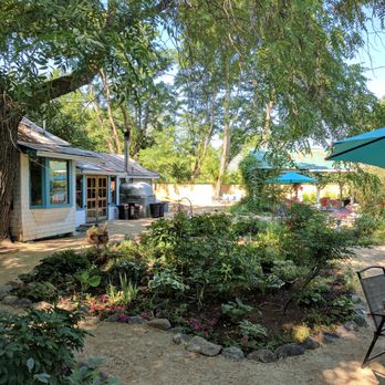 Applegate Country Club - Here's a view of our Beer Garden. It's been called an oasis from the heat, a vortex, a respite, and a magical place. We hope you enjoy it. - Pizza Near Me - Applegate, Oregon