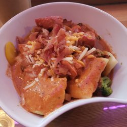 Bliss Coffee - Bowl of Butter Chicken and Perogoies.