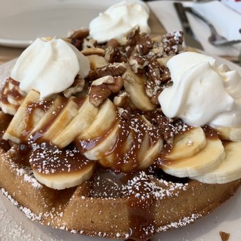 Sunny Morning - Freddy's Caramel Waffle (bananas and pecans drizzled with milk caramel and topped with real whipped cream). Don't miss it! - Breakfast & Brunch Near Me - Oakville, Ontario
