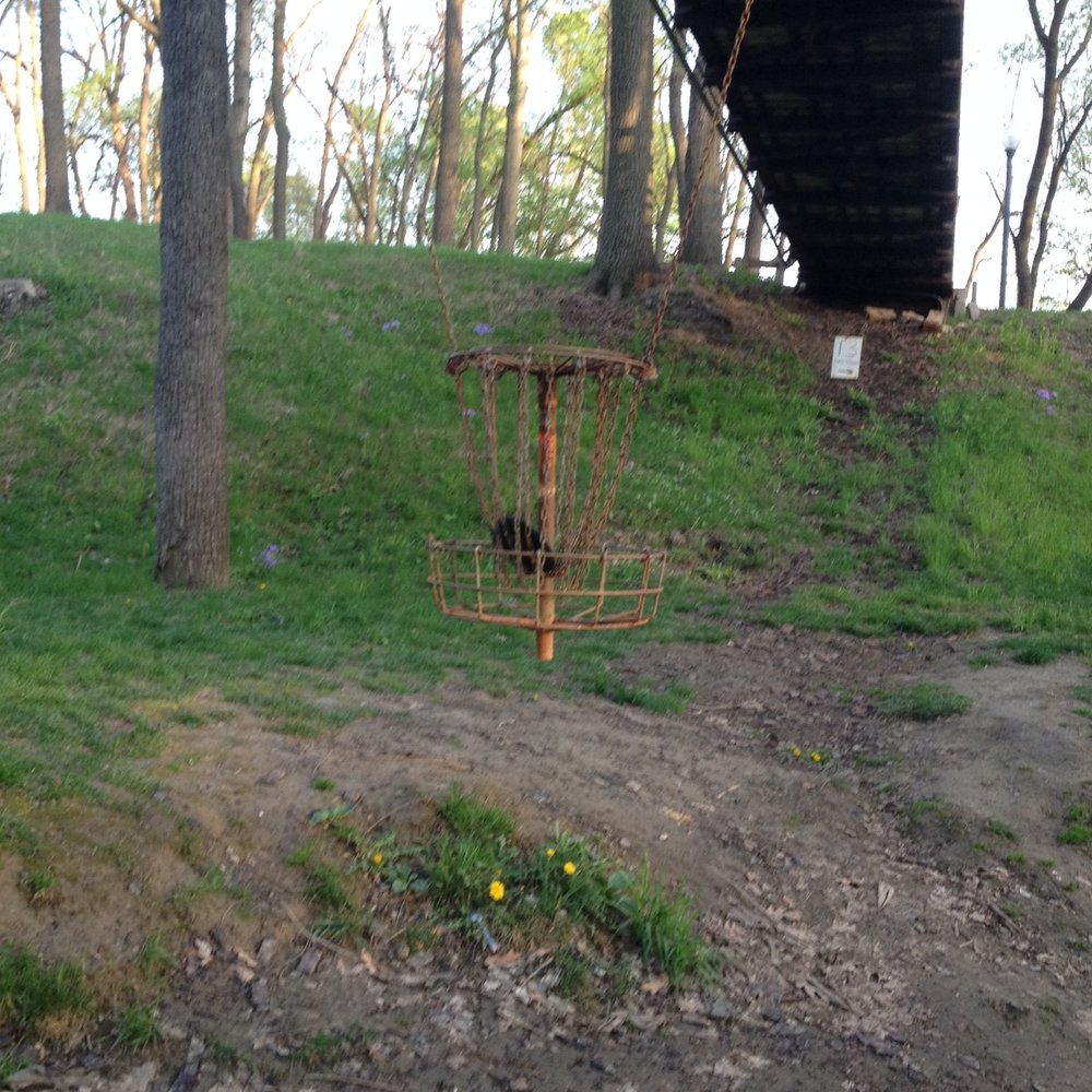Treasure Cove Disc Golf Course - The famous hanging basket. - Disc Golf Near Me - Council Bluffs, Iowa Treasure Cove Disc Golf Course - The famous hanging basket. - Disc Golf Near Me - Council Bluffs, Iowa