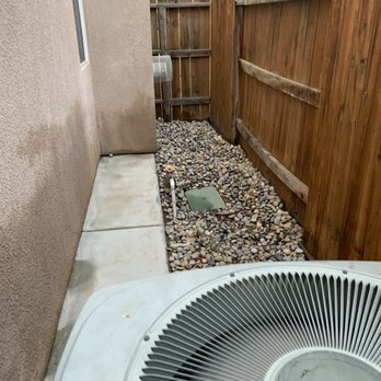 BG Landscape Services - After new sprinkler system with rock - Landscaping Near Me