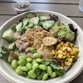 SeoulSpot Eatery - Marinated chicken, cucumber, guacamole, mixed greens, corn, edamame, rice, fried onions  Simple and tasty :) - Asian Fusion Near Me - Tustin, California
