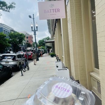 BATTER - Cinnamon roll with sign - Desserts Near Me - New Orleans, Louisiana