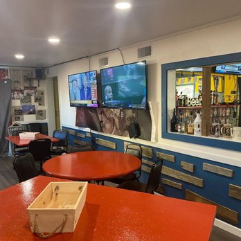 21 Yard Line - a red table with a wooden box on it - Sports Bars Near Me - Lesterville, Missouri 21 Yard Line - a red table with a wooden box on it - Sports Bars Near Me - Lesterville, Missouri