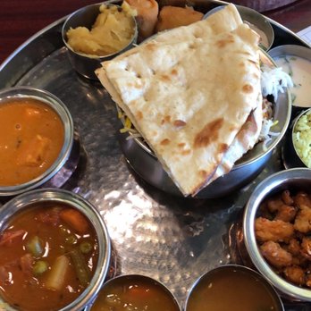 Tabla Indian Restaurant - Veg-Thali- Plain Naan, mix vegetables, Paneer Tikka Masala, Chilli Baby Corn, veg Hyderabadi Veg Dum Biryani, chaajh, dal rice - Indian Near Me - Charlotte, North Carolina Tabla Indian Restaurant - Veg-Thali- Plain Naan, mix vegetables, Paneer Tikka Masala, Chilli Baby Corn, veg Hyderabadi Veg Dum Biryani, chaajh, dal rice - Indian Near Me - Charlotte, North Carolina