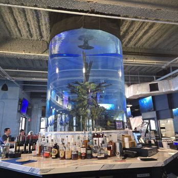 Dive Bar Restaurant - Center of the bar. Beautiful indoor and outdoor seating - Seafood Near Me - Jupiter, Florida