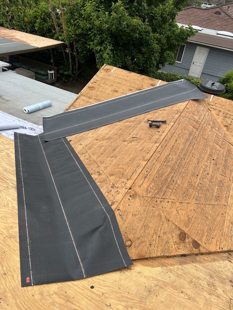 Slide of Heritage Roofing Solutions