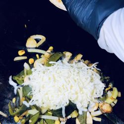 Bliss Harmony Cafe - Grilled POBLANO PEPPER quesadilla, mixed with corn, onions and shredded cheese. It's all about you here!