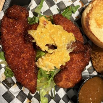 Hickory Tavern - 2-1/2 tenders instead of a chicken breast in the hot honey sandwich - American Near Me - Charlotte, North Carolina Hickory Tavern - 2-1/2 tenders instead of a chicken breast in the hot honey sandwich - American Near Me - Charlotte, North Carolina