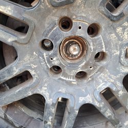 Silva's Tire Center - The exact moment I pulled over to check the sounds coming out of my truck, this is what my wheel looked like driving out of Silva's!