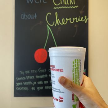 Smoothie King - a hand holding a cup of smoothie - Juice Bars & Smoothies Near Me - Columbus, Ohio