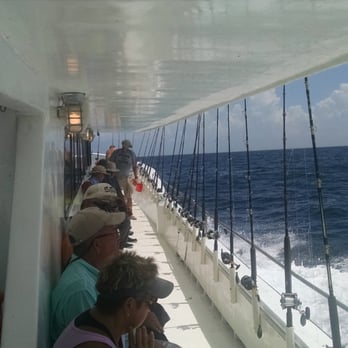 Pelican Adventures - It's tight on a party boat, but that's why it's cost so much less than a private charter. - Fishing Near Me - Destin, Florida Pelican Adventures - It's tight on a party boat, but that's why it's cost so much less than a private charter. - Fishing Near Me - Destin, Florida