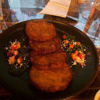 Tryzub Ukrainian Kitchen - Crispy Potato Pancakes w mushroom sauce & sour cream - Ukrainian Near Me - Chicago, Illinois Tryzub Ukrainian Kitchen - Crispy Potato Pancakes w mushroom sauce & sour cream - Ukrainian Near Me - Chicago, Illinois