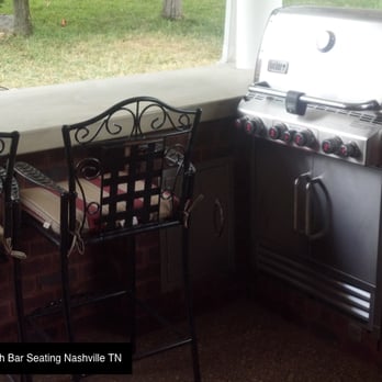 Custom Hardscapes - an outdoor kitchen with a grill - General Contractors Near Me Custom Hardscapes - an outdoor kitchen with a grill - General Contractors Near Me