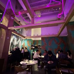 Mai - Modern interior with neon lights and labubu decor