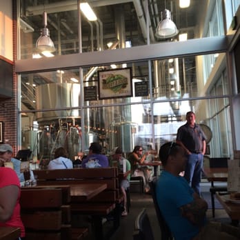 Worthy Brewing - A view from the inside...it was a 40 minute wait for outside seating on this gorgeous August evening. - Breweries Near Me - Bend, Oregon Worthy Brewing - A view from the inside...it was a 40 minute wait for outside seating on this gorgeous August evening. - Breweries Near Me - Bend, Oregon