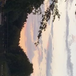 Atwood Lake Park - Bridge by the entrance at sundown .