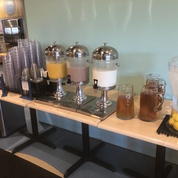 Sandy's Castle Restaurant - a table of drinks and juices - American Near Me - Winter Haven, Florida