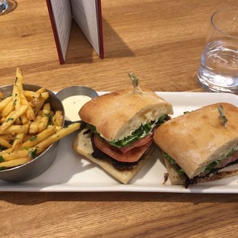 Earls Kitchen + Bar - Blackened Chicken Sandwich and Garlic Fries - New American Near Me - McLean, Virginia