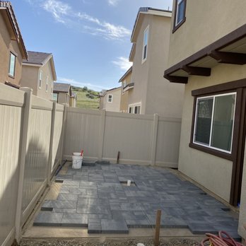 Cervantes Masonry - The awesome layout as requested and then their next stage was cutting the border to fit around the existing fence poles. - Masonry/Concrete Near Me Cervantes Masonry - The awesome layout as requested and then their next stage was cutting the border to fit around the existing fence poles. - Masonry/Concrete Near Me