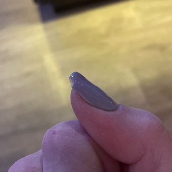 Exotic Nails - 9 hours after manicure, corner broke off. - Nail Salons Near Me - West Covina, California