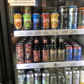 Beermiscuous - Some of their canned & bottled sections. You can buy them for there or to go. - Beer Bar Near Me - Chicago, Illinois