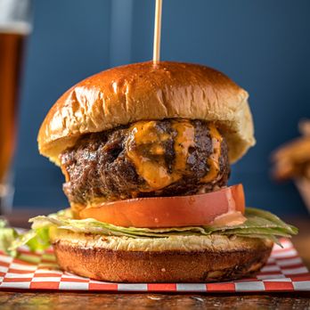 Lucy's - a cheeseburger with lettuce and tomato - American Near Me - Chicago, Illinois Lucy's - a cheeseburger with lettuce and tomato - American Near Me - Chicago, Illinois