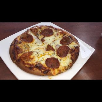 Napoli's Bakery - a pepperoni pizza on a plate - Bakeries Near Me - Miami, Florida Napoli's Bakery - a pepperoni pizza on a plate - Bakeries Near Me - Miami, Florida