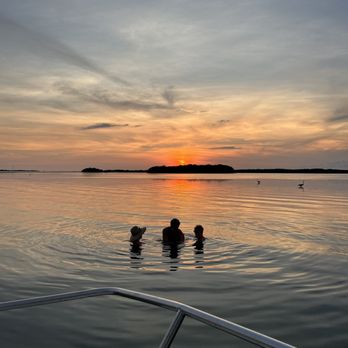 Florida Aqua Tribe - Watching the Sun disappear behind Shell key from the water is a unique experience unlike any other. - Boat Charters Near Me Florida Aqua Tribe - Watching the Sun disappear behind Shell key from the water is a unique experience unlike any other. - Boat Charters Near Me